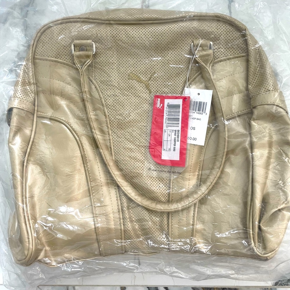 PUMA Gold colored travel bag •BRAND NEW• With Tags•